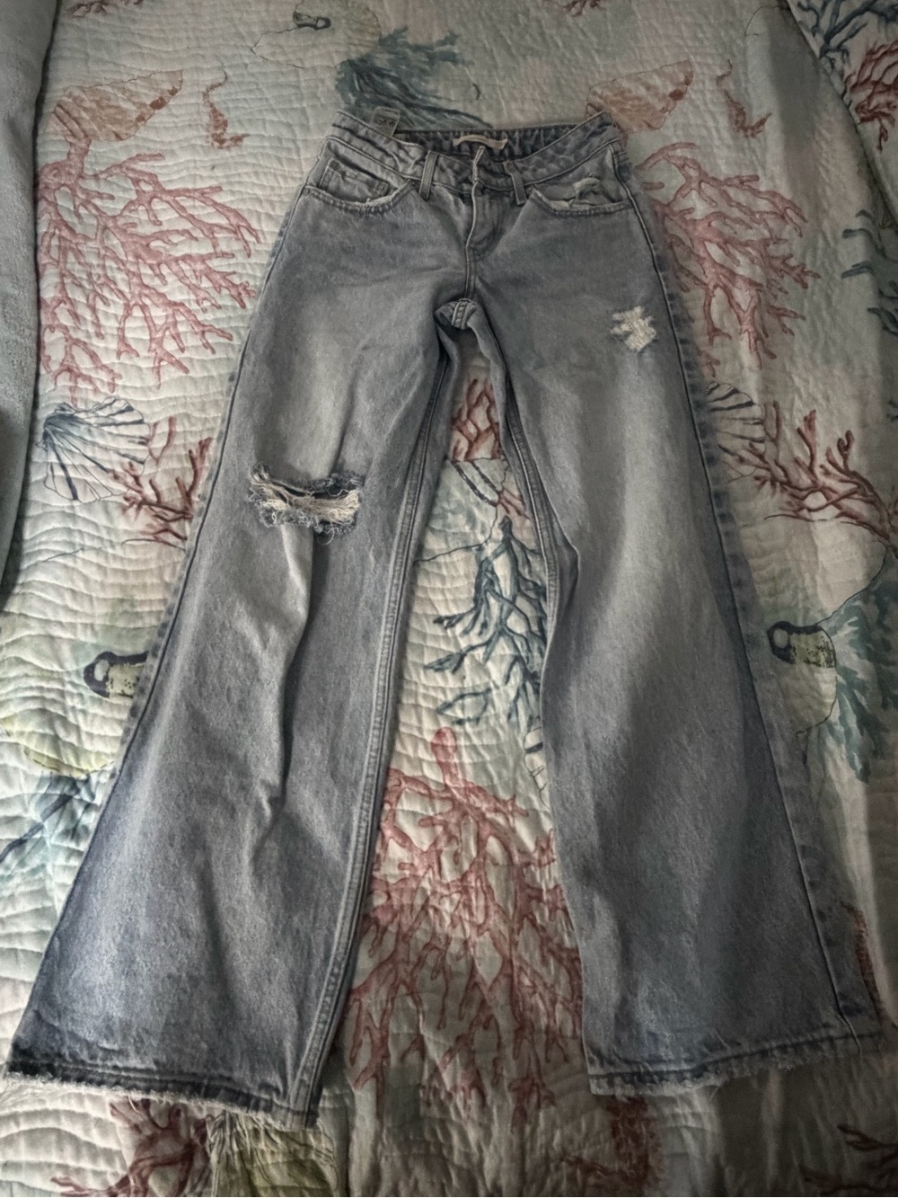 Levi's Light Gray High-Rise Flared Jeans with Distressed Knee
